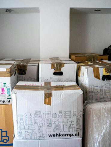 brown cardboard boxes on brown wooden table