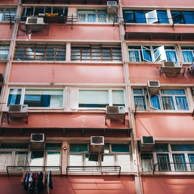 low-angle photography of red building